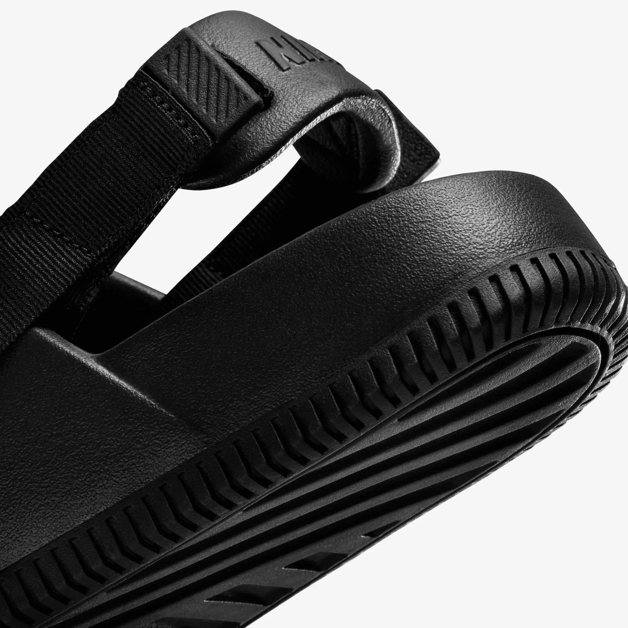 NIKE | WMN'S CALM MULES { BLACK/BLACK